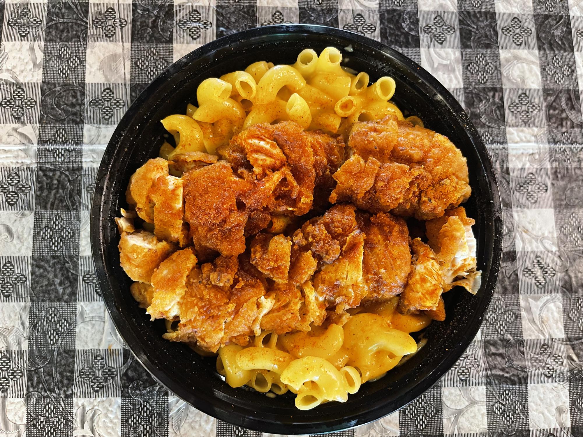 Jaxon's Chix Tenders, Billy Ray's Mac & Queso Bowl: a cheesy, spicy combo that piles two jumbo spicy tenders sliced over creamy mac and cheese.