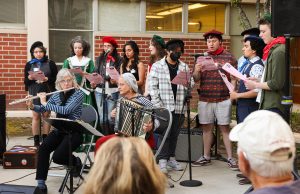 FC's French club opens night one of the French Film Festival with songs they prepared weeks in advance.
