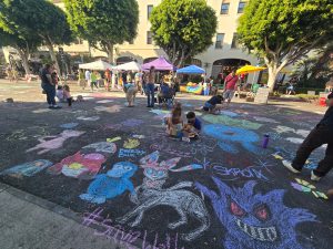 Locals gather on Walk on Wilshire on Sept. 8, 2024, for an event hosted by the volunteer group Save Walk on Wilshire. 