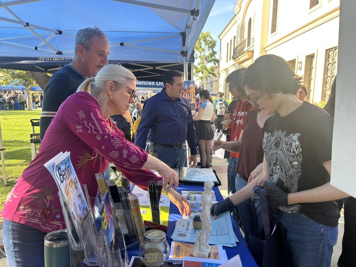 High school students learn about what programs the Art Department has to offer at FC Night on April 30, 2025.