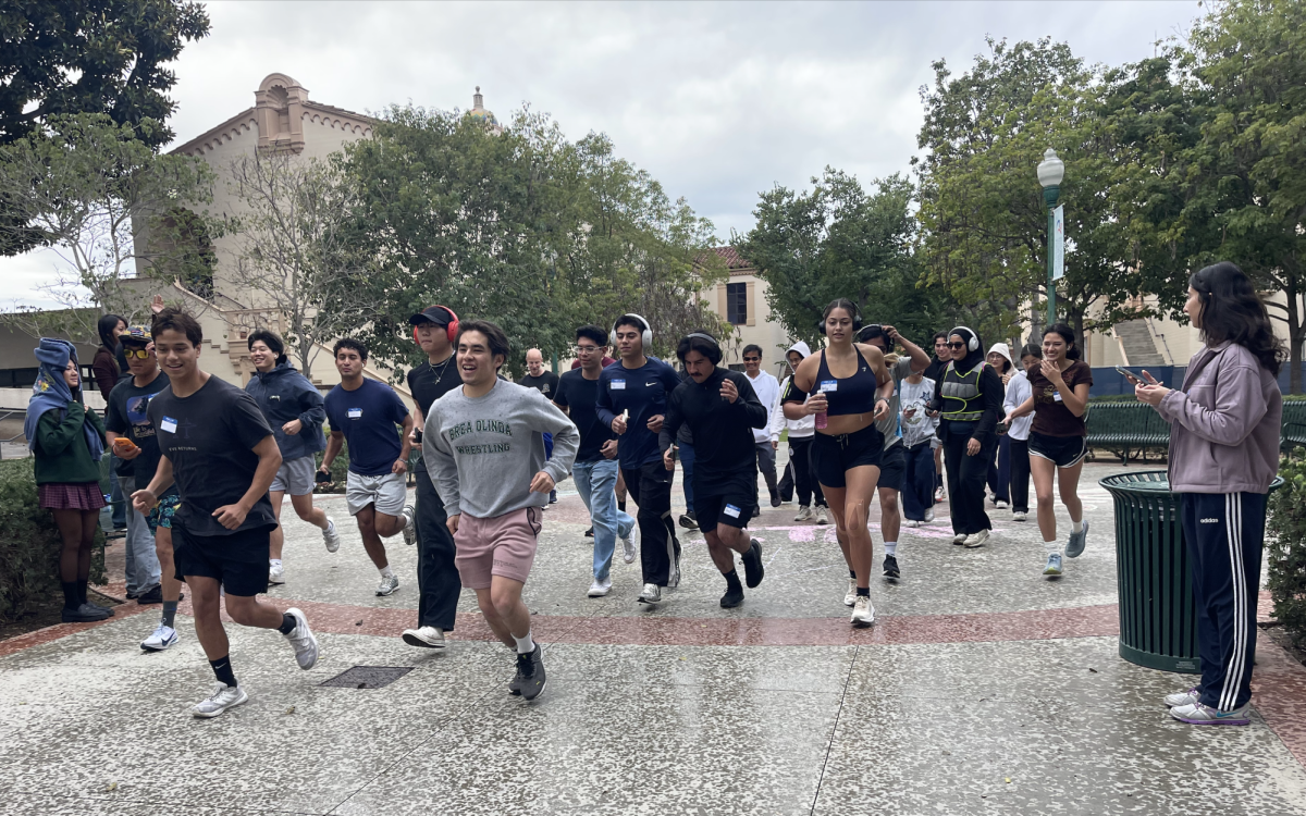 Despite light rain, participants take off at the start of FC's Biology Club 5K for CHOC on Saturday, Nov. 22, 2025, in Fullerton, Calif. The club hosted the event to benefit Children’s Hospital of Orange County and continued fundraising with food, drink and sticker sales and a haircut challenge.