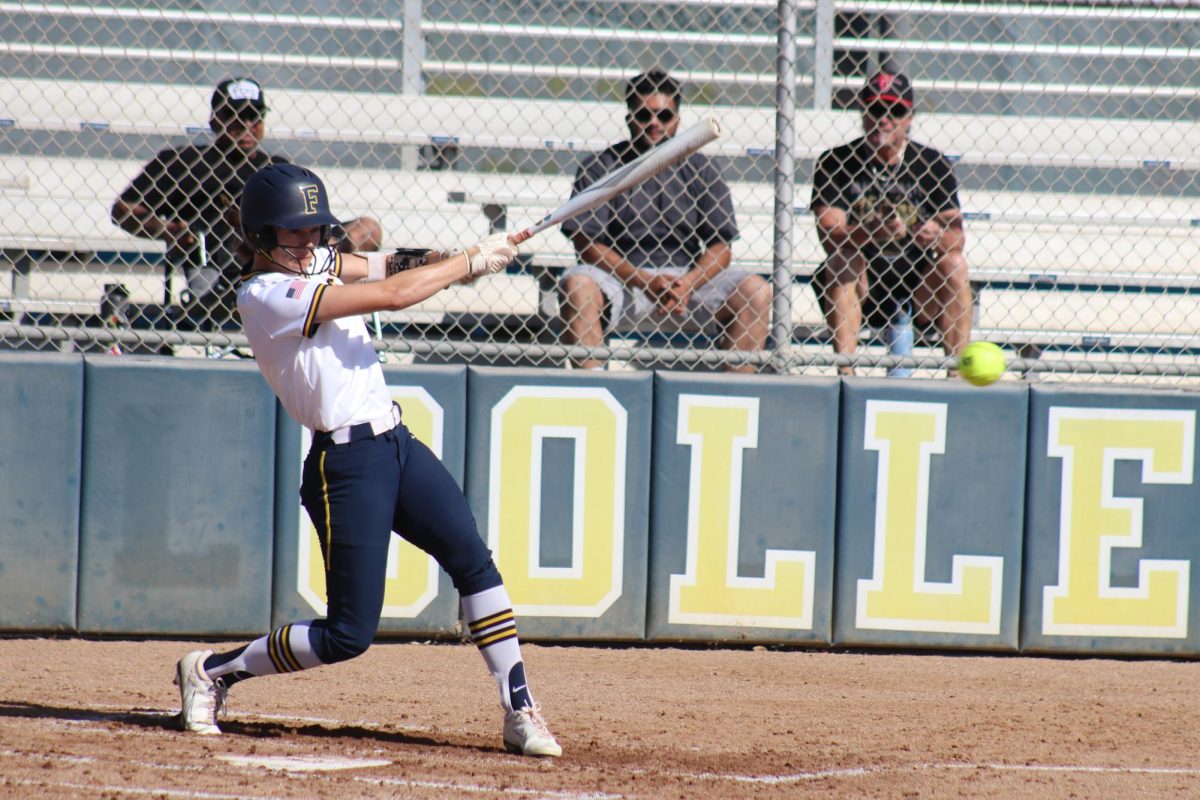 Fullerton left fielder Juliana Ursino smokes a liner over to Santa Ana first baseman Aliza Mindiola for an out in the third inning, on March 24, 2026 in Fullerton, Calif.
