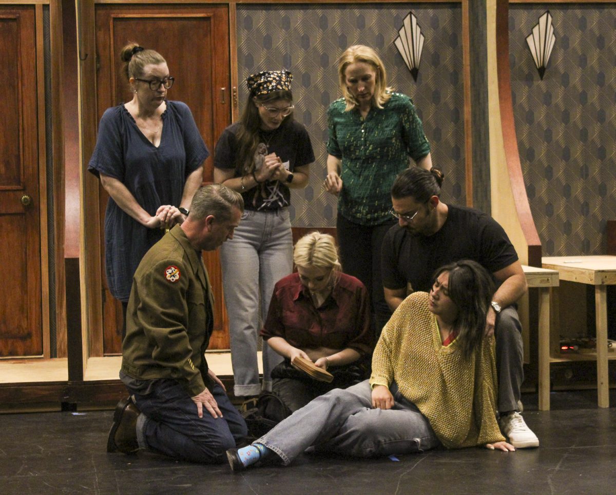 The passengers of the Orient Express investigate the site of an unseen attack. 
(From Left to Right - Back: Holly Jones [Princess Dragomiroff], Olivia Oakley [Greta Ohlsson], Tanya Reisen [Helen Hubbard]. Front: Shawn Plunkett [Colonel Arbuthnot], Emily Hood [Countess Adrenyi], Catalina Tan [Mary Debenham], and Abel Miramontes [Hercule Poirot]).
